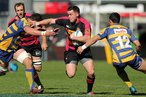 Ryan Crotty of Canterbury breaks through tackles during the round 15 ITM Cup match between Canterbury and Bay of Plenty at AMI Stadium. Photo / Getty Images