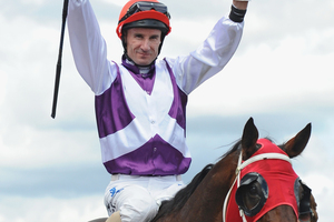A jubilant Glen Boss returns to scale aboard Ocean Park after their success in the Caulfield Stakes on Saturday. Photo / Getty Images