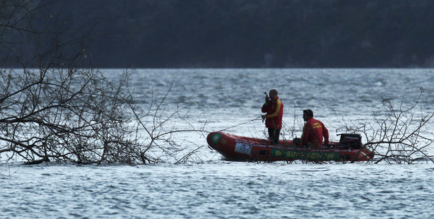 A surf lifesaving IRB is used in the search. Photo / Alan Gibson
