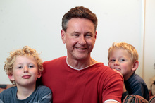 Dave Cotton with Christopher, 8, and Samuel, 6. Photo / Michael Craig