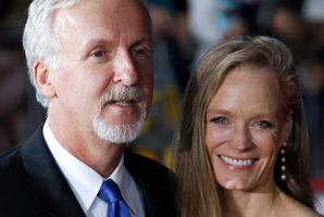 Hollywood director James Cameron and Suzy Amis, his fifth wife. Cameron reckons he can never resist an upgrade. Photo / AP
