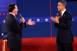 Republican presidential nominee Mitt Romney and President Barack Obama speak during the second presidential debate. Photo / AP
