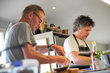 Behind the scenes on the set of the new Peter Gordon cookbook with Grant Allen (left). Photo / Jason Dorday