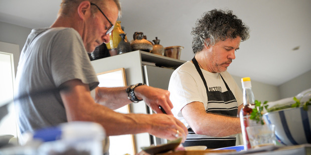 Behind the scenes on the set of the new Peter Gordon cookbook with Grant Allen (left). Photo / Jason Dorday