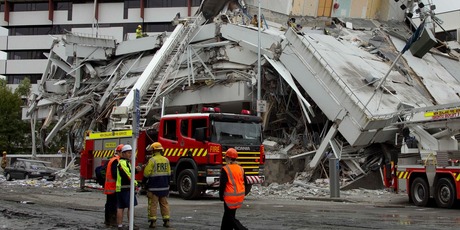 Fire service personnel were some of the first emergency services at the scene of the Pyne Gould Corporation building after the February earthquake. File photo Simon Baker