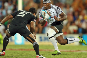 Osea Kolinisau of Fiji makes a break during tjhe Gold Coast Sevens final. Photo / Getty Images
