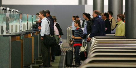 About 179,100 short-term visitors arrived in New Zealand last month down from 219,900 visitors in September 2011. Photo /
