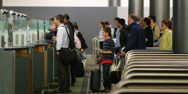 About 179,100 short-term visitors arrived in New Zealand last month down from 219,900 visitors in September 2011. Photo /
