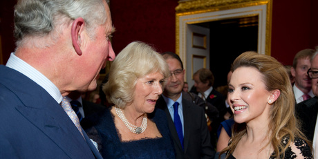 Australian pop singer Kylie Minogue meets Britain's Prince Charles and his wife Camilla, Duchess of Cornwall at St James's Palace in central London. Photo / AP