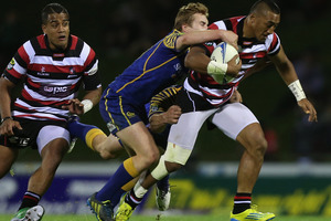Rey Lee Lo of Counties Manukau is tackled during the ITM Cup Championship Final match between Counties Manukau and Otago. Photo / Getty Images.