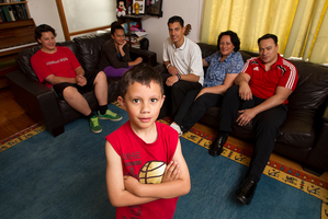 The Johansson family (from back left) Hyrum, 15, Martha, 11, James, 17, and parents Martha and Adolf, with 5-year-old Adolf at front, have had to make sacrifices to cope. Photo / Steven McNicholl