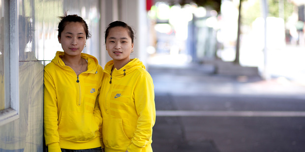 Sining Geng (left) and sister Sixia were assured by an agent their application would be successful. Photo / Dean Purcell