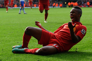Raheem Sterling celebrates scoring on debut. Liverpool wants to nurture his development. Photo / Getty Images