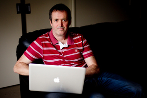 Auckland hotel apartment resident Jeff Thompson says visitors to New Zealand would expect free internet access at hotels. Photo / Dean Purcell