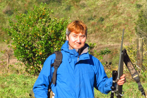 Desmond Siow Hong Kuik emerges from the bush. Photo / APN