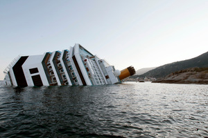Francesco Schettino The Costa Concordia is impaled on two rocky spikes off the tourist beaches of Giglio Island. Photo / Gregorio Borgia