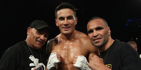 Sonny Bill Williams poses with former trainer Tony Mundine (L) and Anthony Mindine after winning the Battle for the Belt match