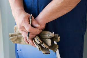 The men are wearing blue overalls and high visibility vests to look unsuspicious. Photo / Thinkstock