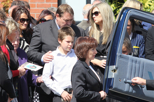 The rugby community in Christchurch turned out to support Steve Hansen (centre) at the funeral, delayed until after Saturday's test in Brisbane.