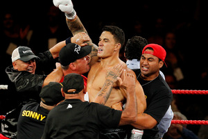 Sonny Bill Williams celebrates his victory over Clarence Tillman III in February. Photo / Christine Cornege