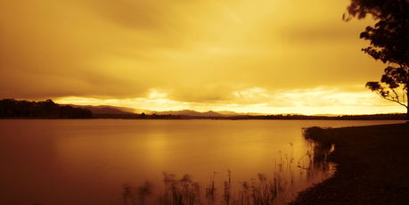 Sunset at Bullrocky rest at Lake Samsonvale looking towards the D'Aguilar mountain range. Photo / Creative Commons image by Flickr user l.bailey_beverley