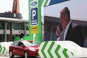 An adroit and quick piece of kerbside parking won the trophy for expat Englishman Jon Acock (top right).