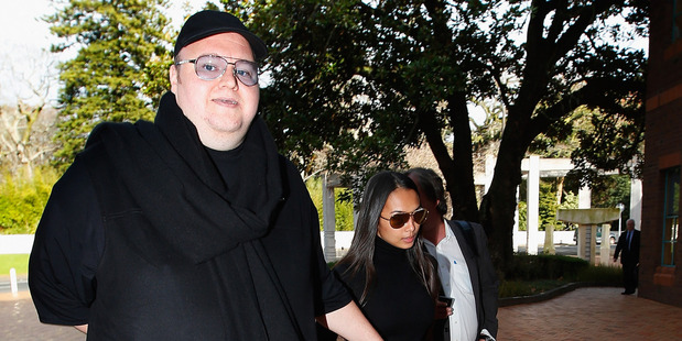 Kim Dotcom, with wife Mona, says NZ would attract foreign business. Photo / Getty