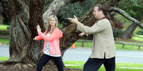Rachel Grunwell takes a Qigong class with Henri-Noel Venturini at Auckland Domain. Photo / Doug Sherring