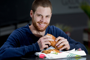 Graphic design student Joe Tiddy enjoys a healthy sandwich and fruit when he eats out. Photo / Sarah Ivey