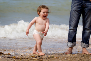 18-month-old Grace Steenkamp enjoys the warm weather at Mission Bay in Auckland yesterday. Photo / Sarah Ivey
