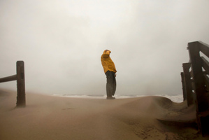Rains ahead of Hurricane Sandy blow across the beaches of Sandbridge in Virginia Beach. Photo / AP
