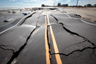 Road to nowhere. North Carolina 12 is buckled from pounding surf leading into Mirlo Beach in Rodanthe, N.C. Photo / AP Road to nowhere. North Carolina 12 is buckled from pounding surf leading into Mirlo Beach in Rodanthe, N.C. Photo / AP