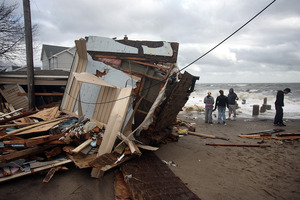 The devastation wrought by Hurricane Sandy has distracted voters from the election. Photo / AP