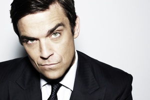 Robbie Williams says he's a loved up father.Photo / File