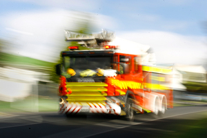 The children were safe on a neighbour's lawn when fire crews arrived. Photo / File / Bradley Ambrose