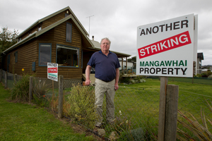 More than 500 Mangawhai residents refuse to pay an estimated $1 million or more to the debt-ridden Kaipara District Council. Photo / Steven McNicholl