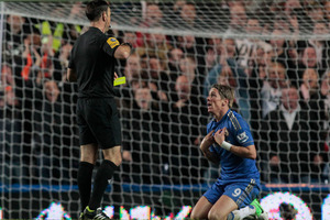 Chelsea's Fernando Torres, right, reacts to his second yellow card during their English Premier League soccer match against Manchester United at Stamford Bridge. Photo / Getty Images.