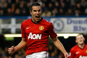 Manchester United's Robin van Persie celebrates after scoring a goal during an English Premier League soccer match. Photo / Getty Images.