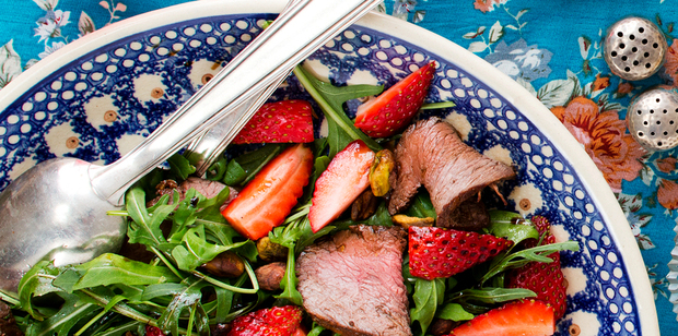 Strawberry salad with venison, rocket, pistachio and balsamic. Photo / Babiche Martens