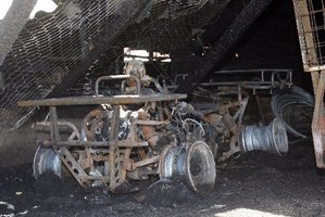 The remains of a quad bike after a fire in a shed on a Carterton farm. Photo / Wairarapa Times-Age
