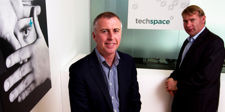 Clayton Wakefield (left) and David Graham, who started running Techspace from a cafe table, now employ 30-40 people. Photo / Steven McNicholl