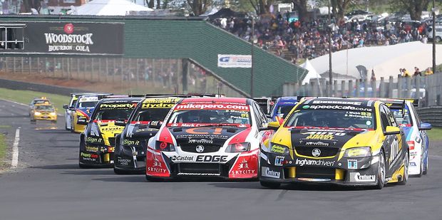 Race one startline negotiations between the top V8 SuperTourers qualifiers as they head into the esses at Pukekohe Park Raceway. Photo / Supplied