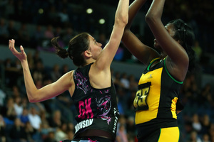 Jhanueke Fowler of Jamaica shoots over Anna Harrison. Photo / Getty Images