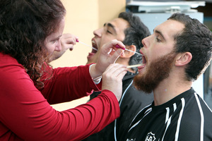 Trent Boswell-Wakefield and Johan Schoonbee from the Hawke's Bay Magpies rugby team get involved in a rheumatic fever promotion. Photo / Glenn Taylor
