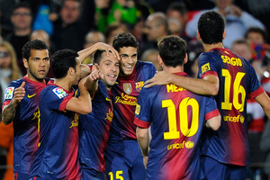 FC Barcelona's Jordi Alba, center, reacts after scoring against Celta Vigo during a Spanish La Liga soccer match at the Camp Nou stadium in Barcelona. Photo / Getty Images.