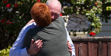 Family members console each other. Pictures / Brett Phibbs