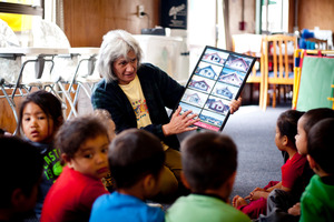 Hera Tiakiwai teaches pre-school children at the Te Tira Hou Marae in Panmure. Photo / Dean Purcell