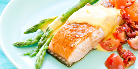 Grilled Regal salmon with asparagus, citrus hollandaise and tomato duo. Photo / Kieran Scott