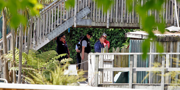 Rainbow's End management inspect the scene of the accident yesterday. Photo / Michael Craig