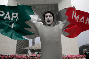 An anti-gay marriage birdman protests at a Paris demonstration. Photo / AP